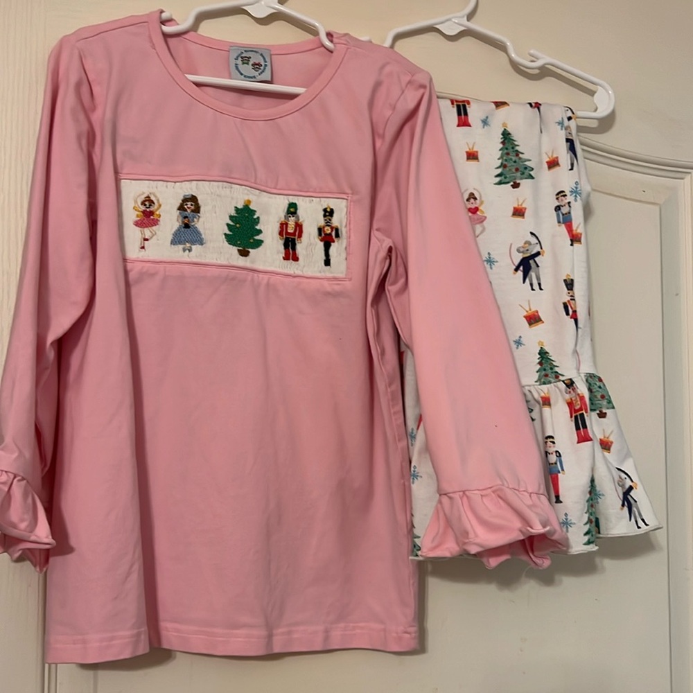 Pink Nutcracker smocked shirt with leggings.